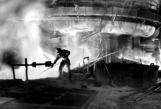 Steel worker in factory