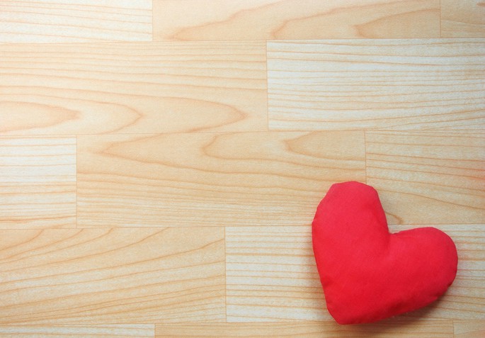 red heart on wood pannels