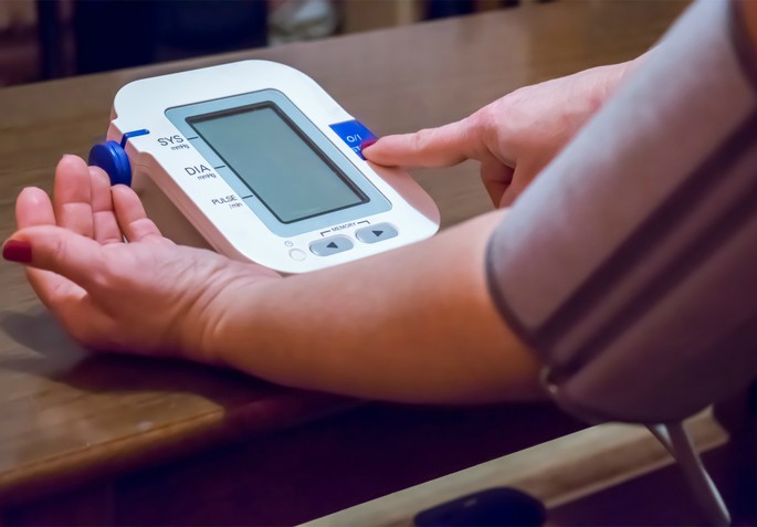 woman taking blood pressure