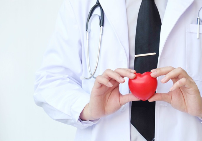 doctor holding heart