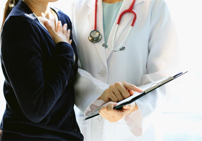 woman talking to doctor