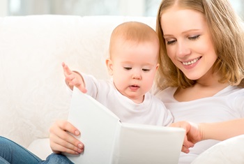 mom and baby reading