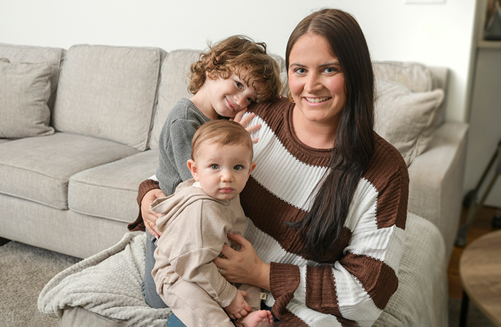 Cole Mickey relaxes with his brother Cade and mom Brittney.