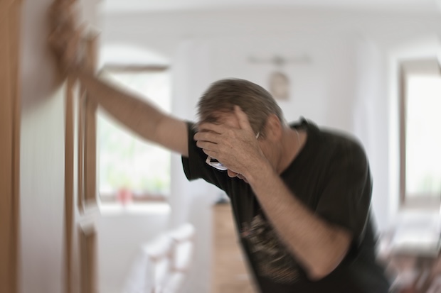 Man suffering from ringing in his ears