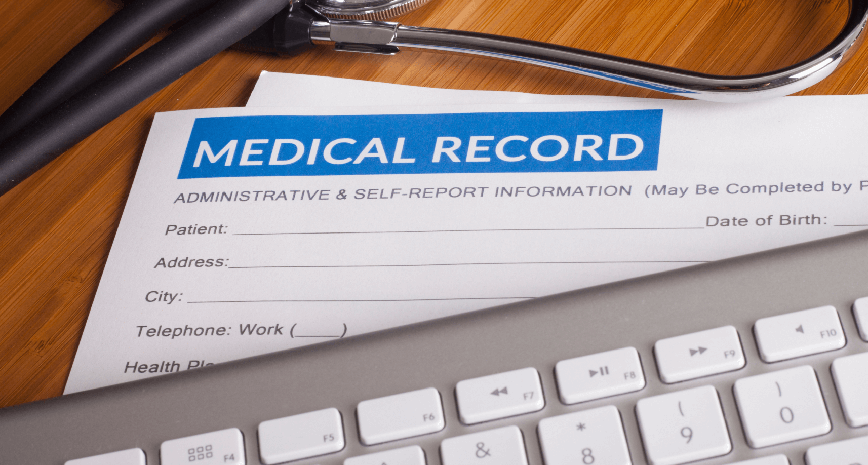 Desk with medical record paperwork