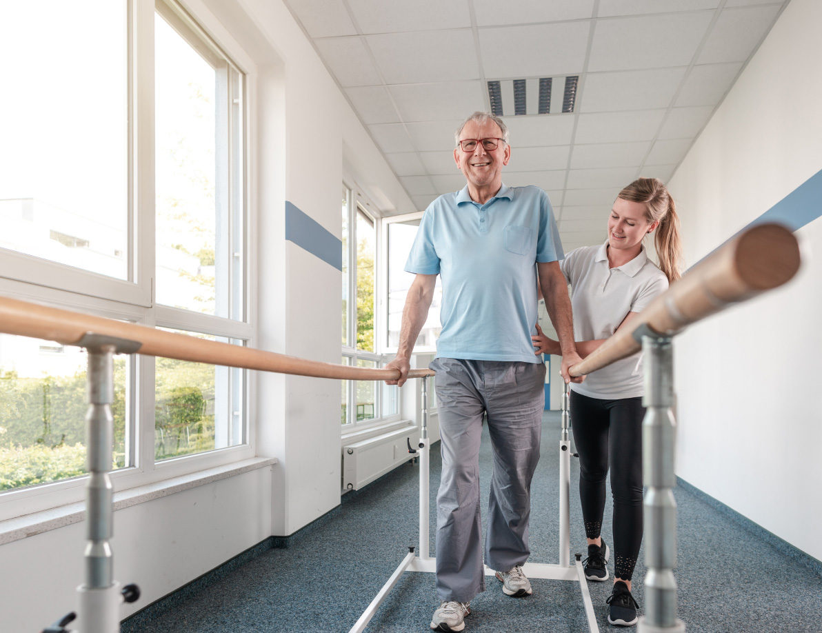 Medical Professional assisting a patient walking