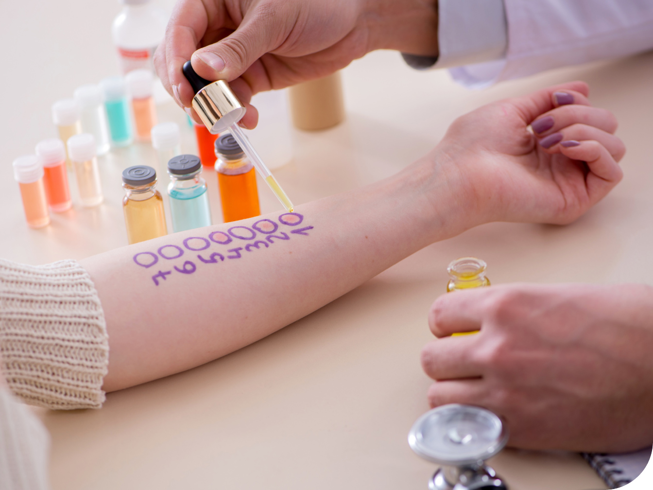 Medical professional doing an allergy test on patient