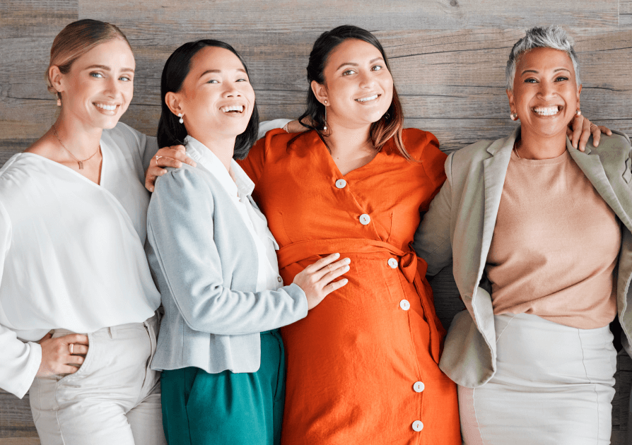 Group of women around pregnant friend