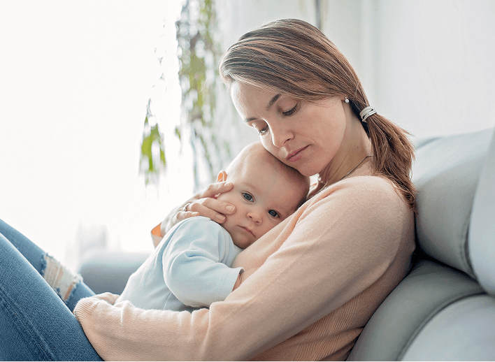 Mother holding her newborn baby