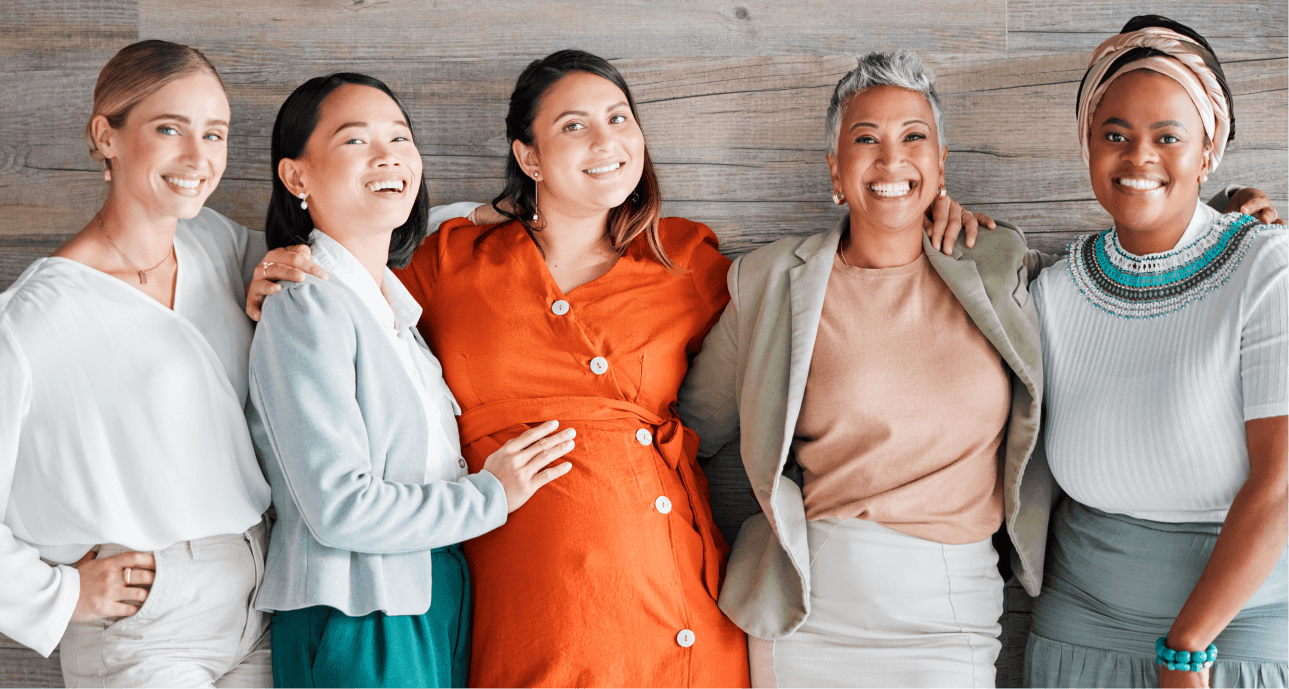 Group of women around pregnant friend