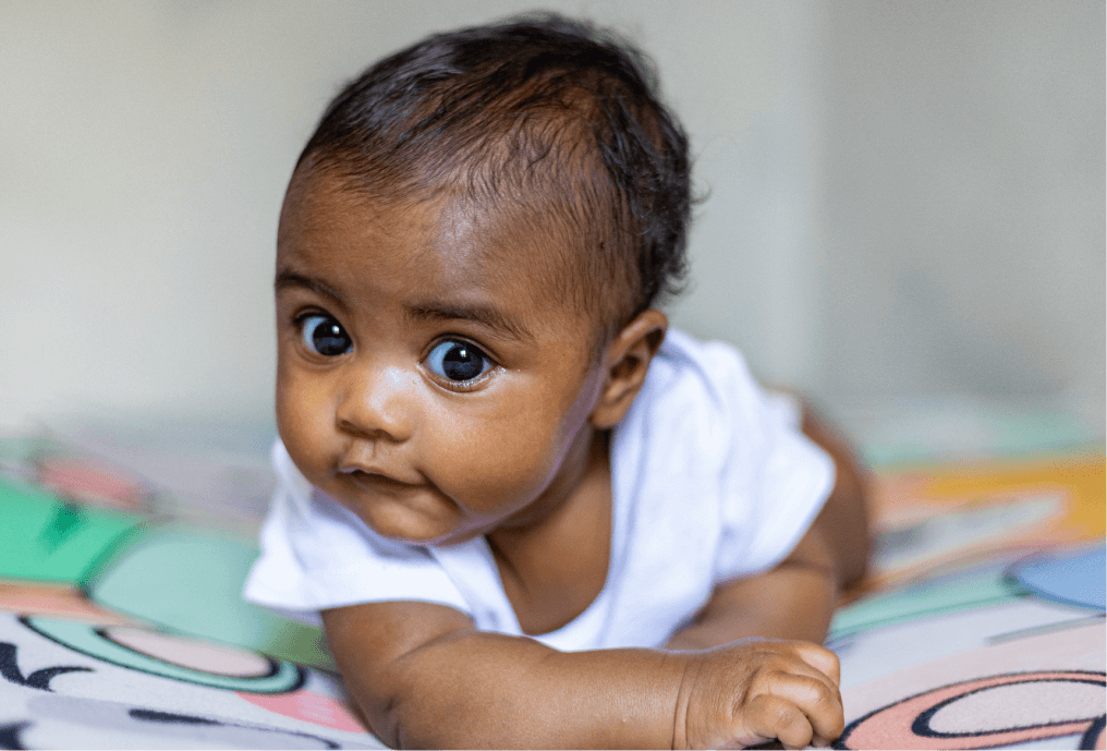 Infant working on tummy time