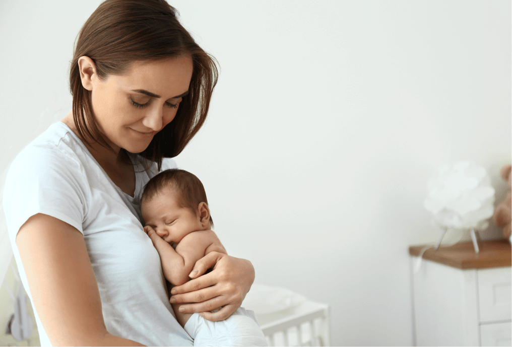 Mother holding her newborn baby