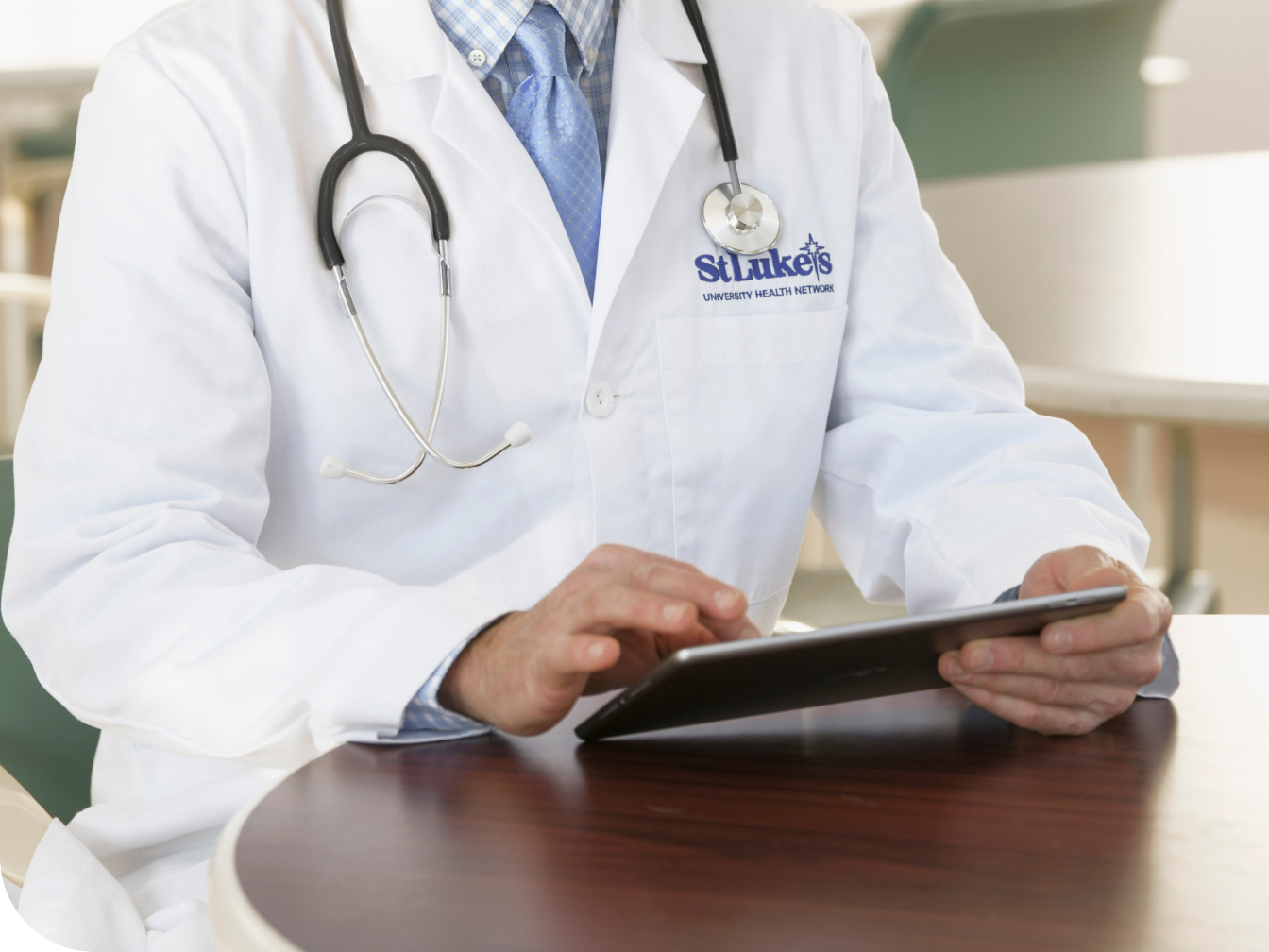 Medical Professional working on a tablet device