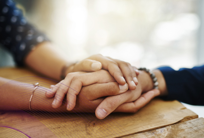 Holding patient's hand