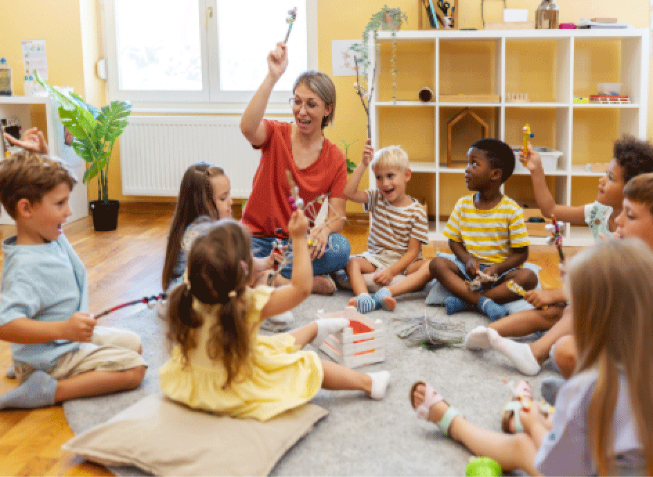 Group of children in a circle with their teacher