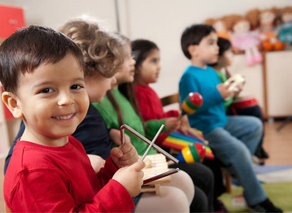 Young children in a music class