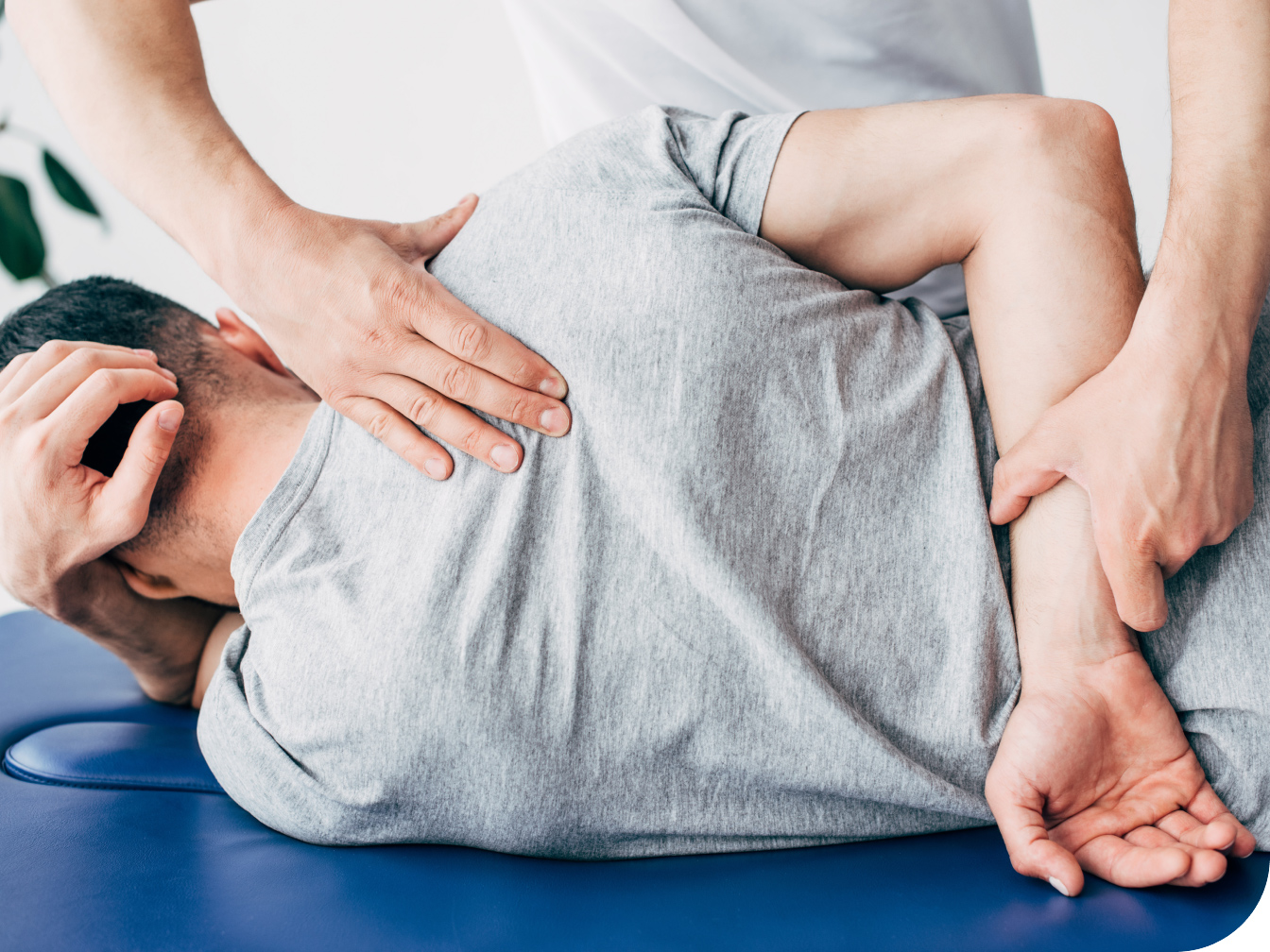Patient getting an adjustment on a chiropractic table