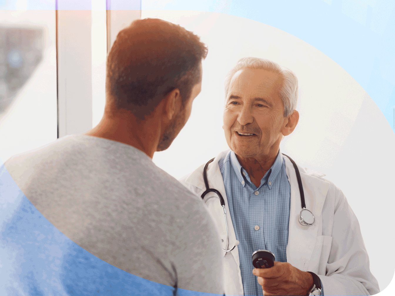 Doctor talking with patient