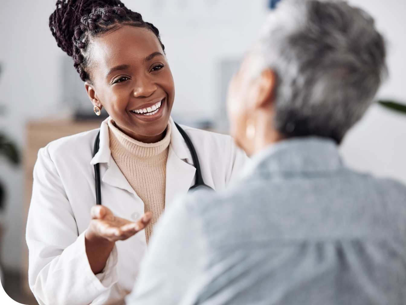 Medical Professional laughing with a patient