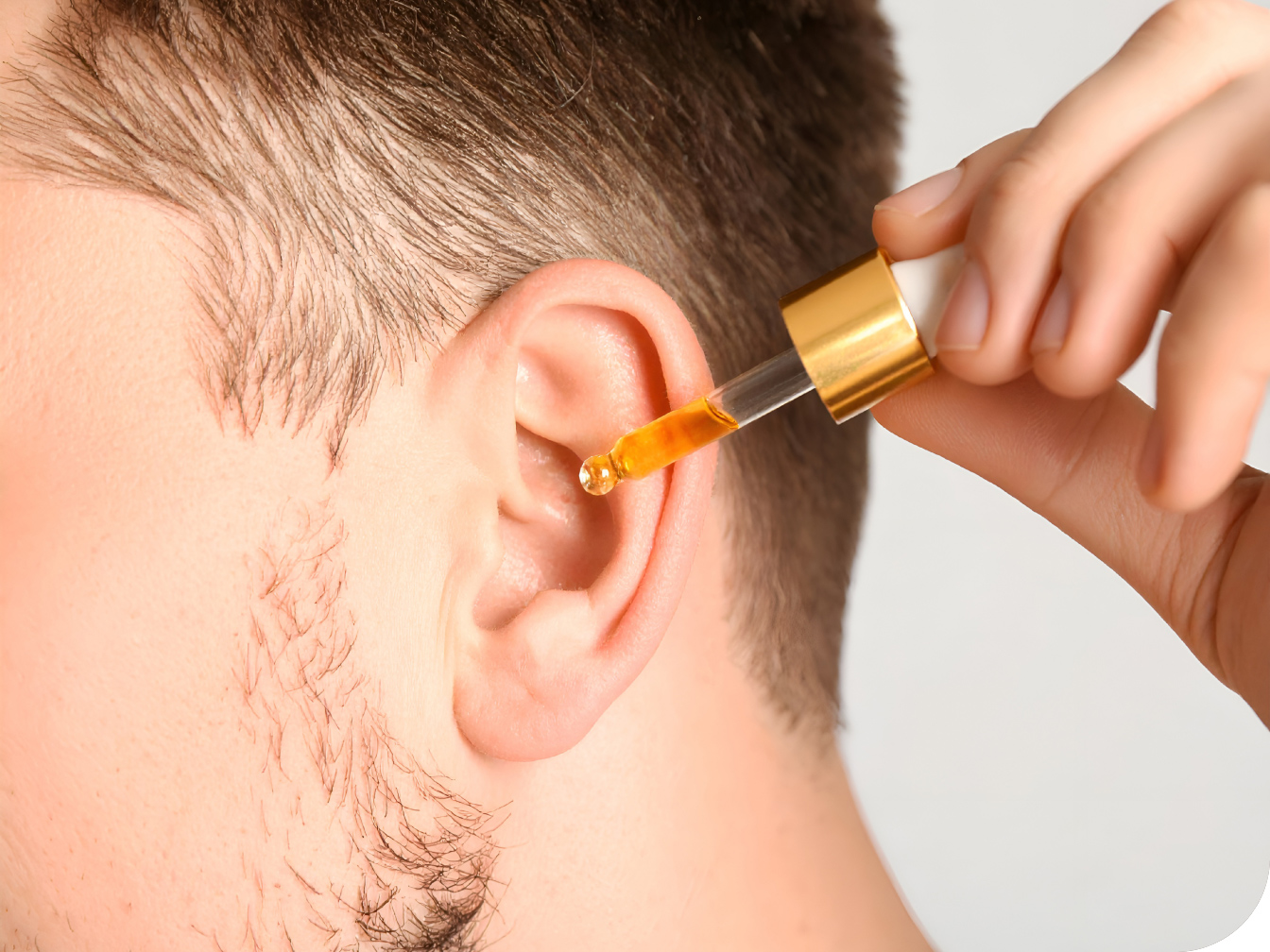 Patient getting ear drops