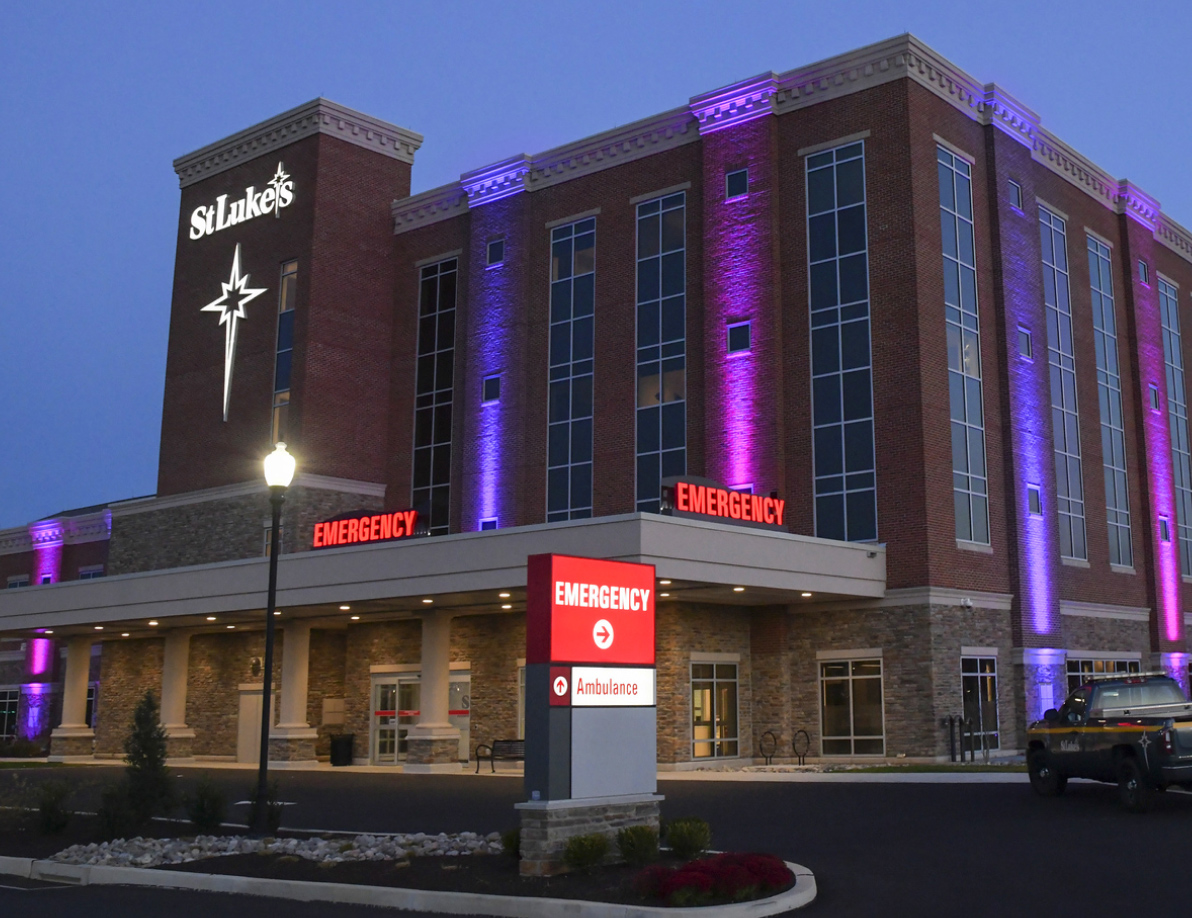 St. Luke's building lite up at night