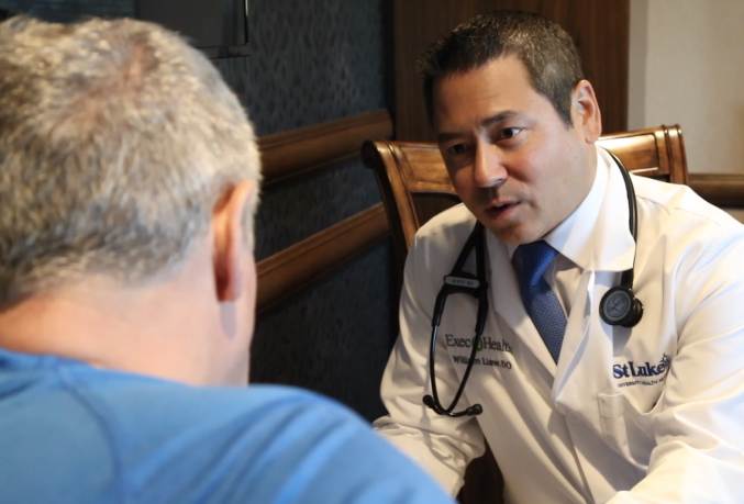 Doctor talking with a patient