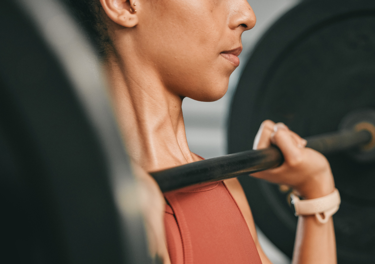 Woman lifting a barbell 