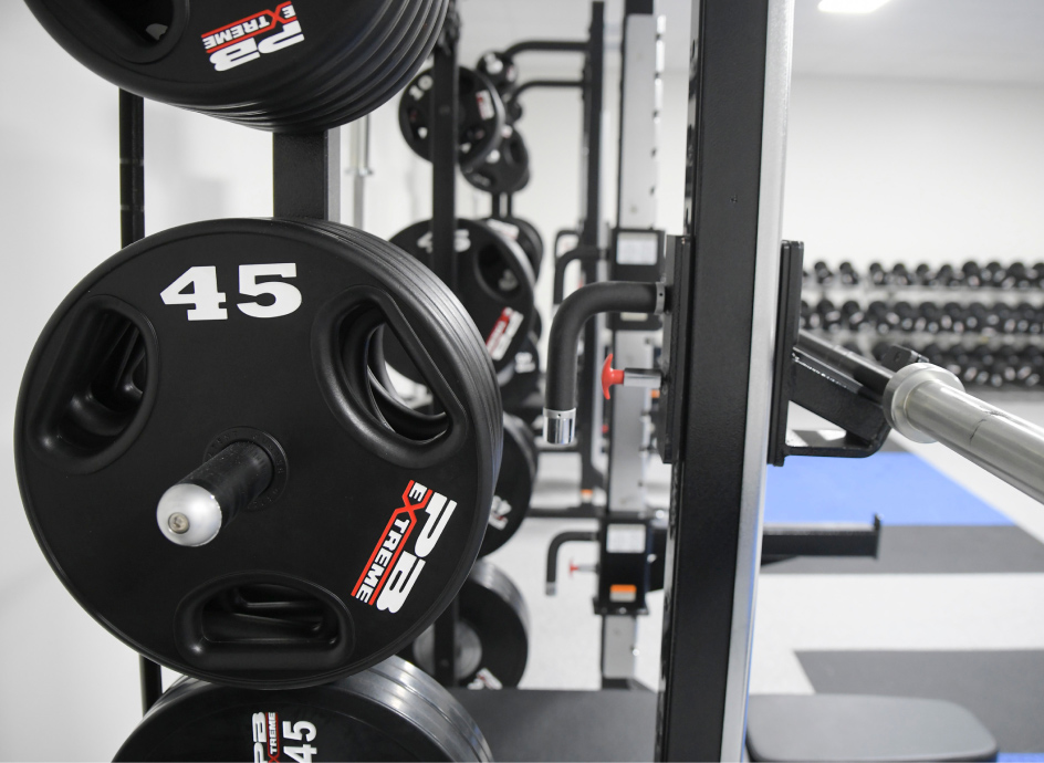 Weight rack and power racks inside of a gym