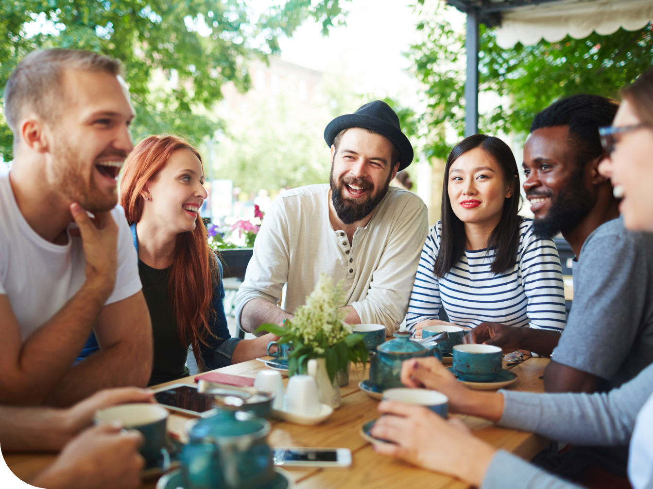 Group of friends around a dining table