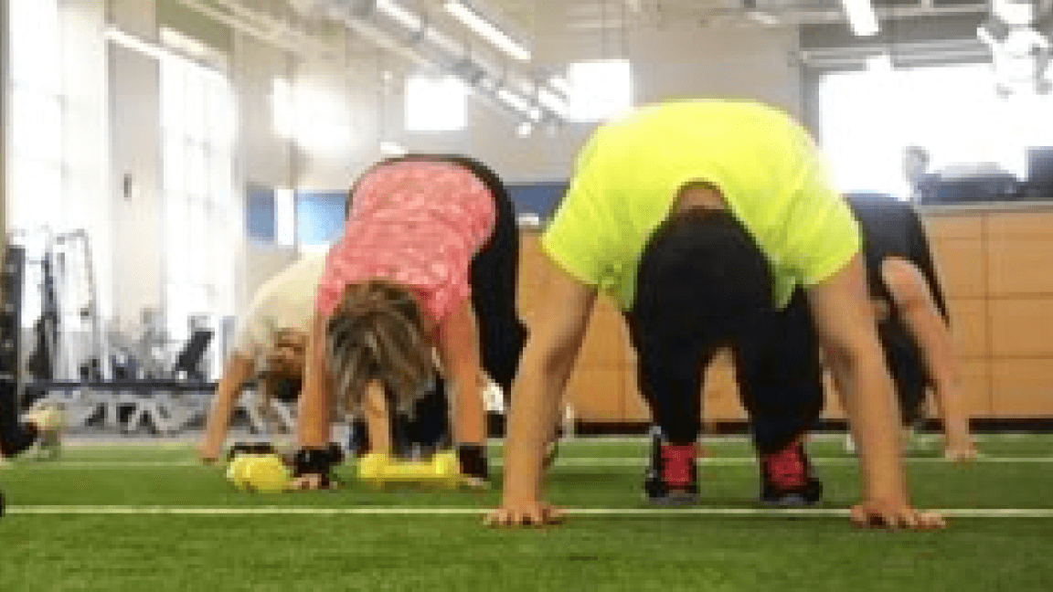 Group working out at a gym together