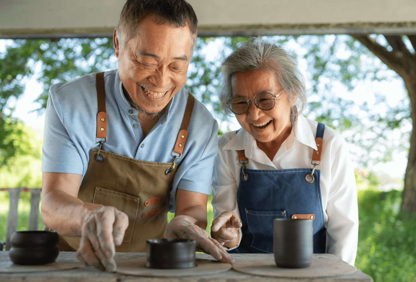 Elderly couple planting
