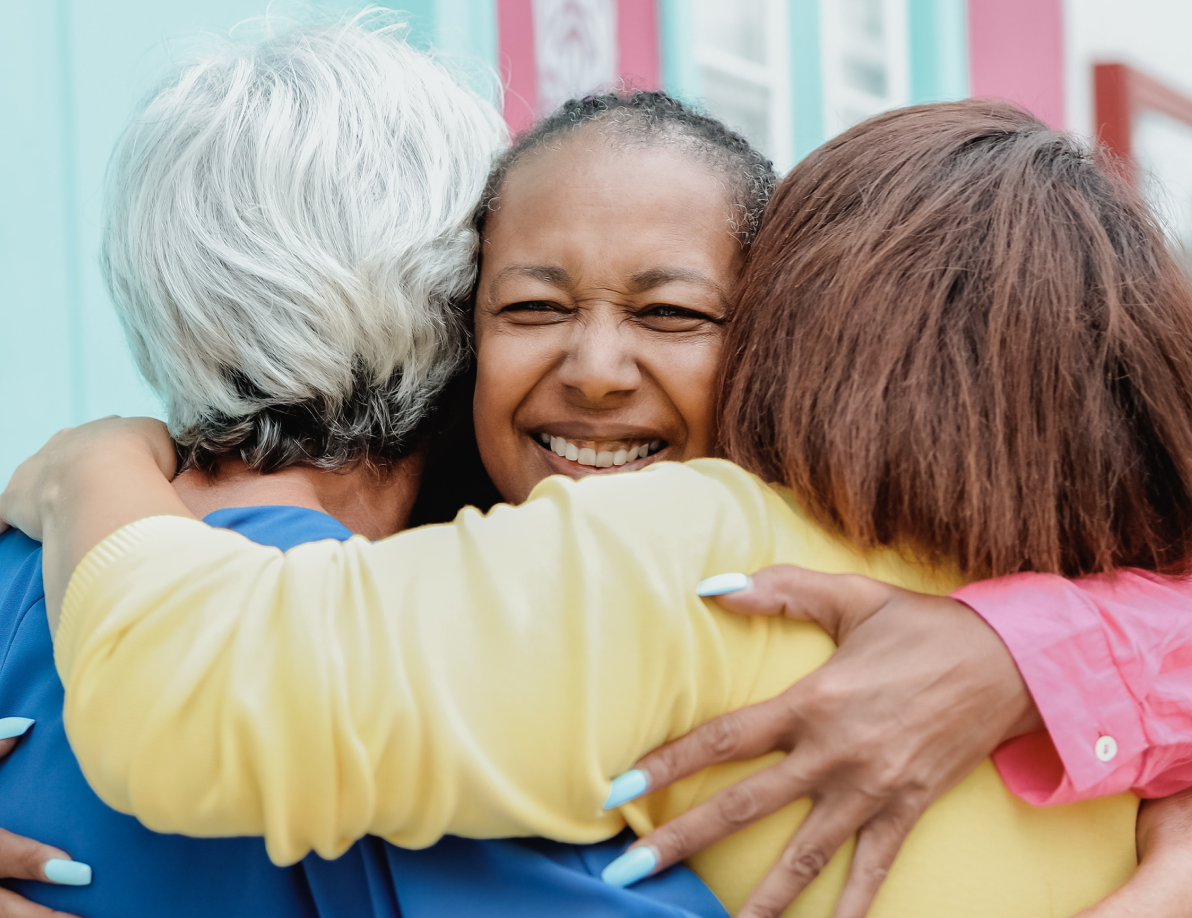 3 women hugging