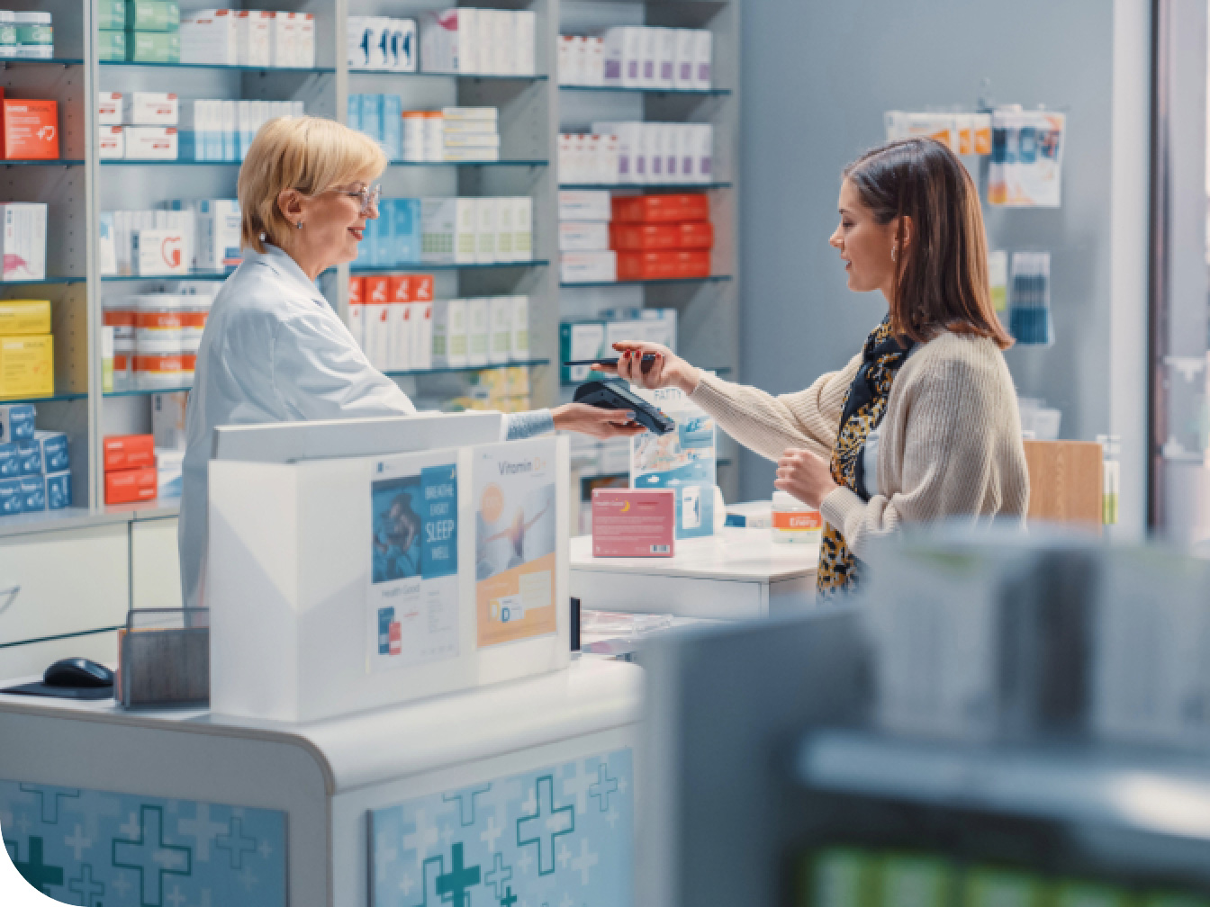 Pharmacist assisting a customer at a pharmacy
