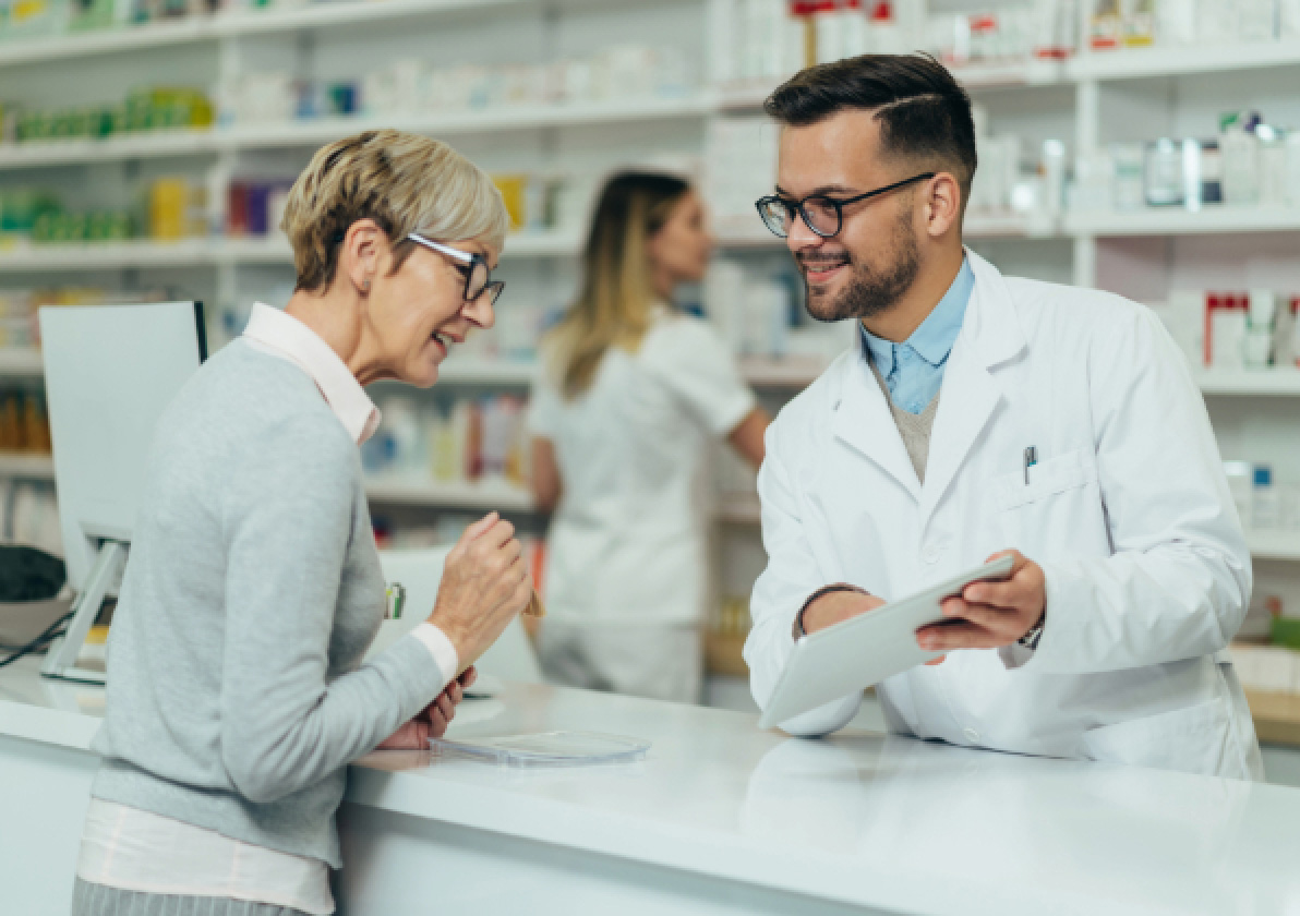 Pharmacist talking with a customer