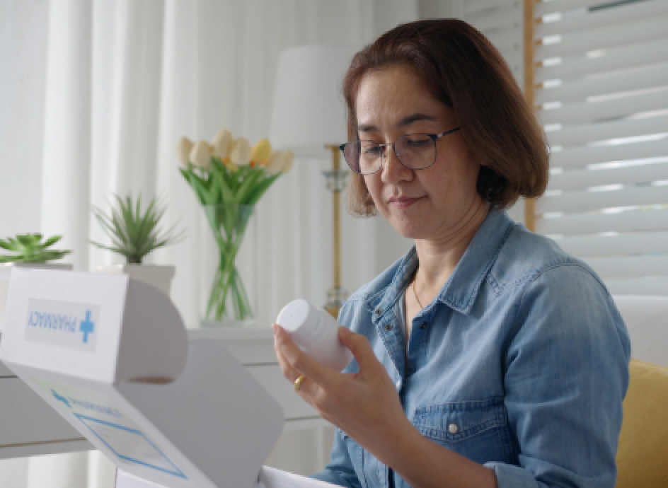 Pharmacy customer checking out their pharmacy home delivery
