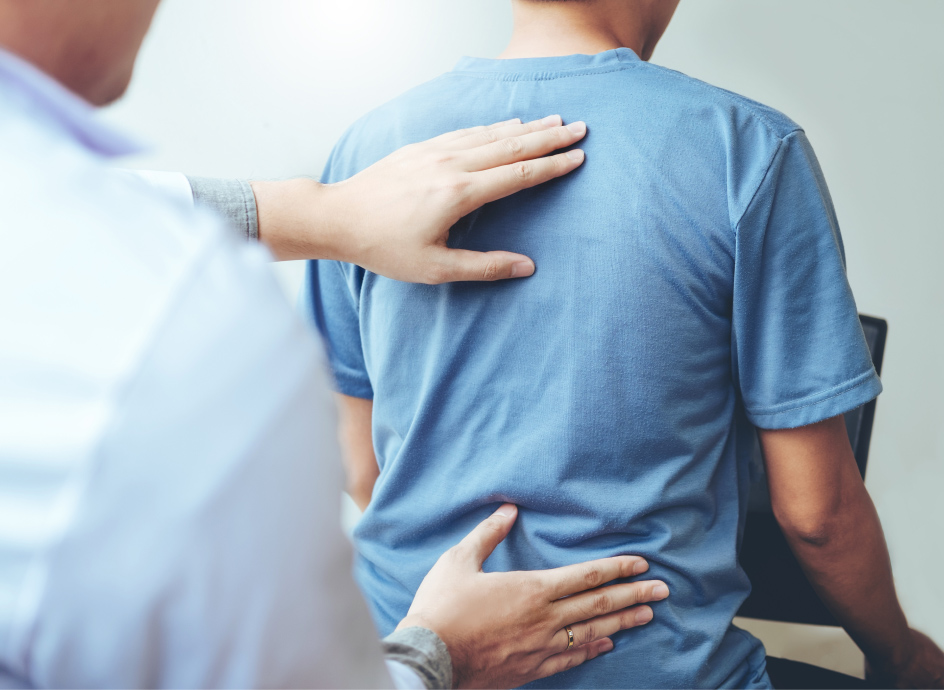 Chiropractor adjusting a patient