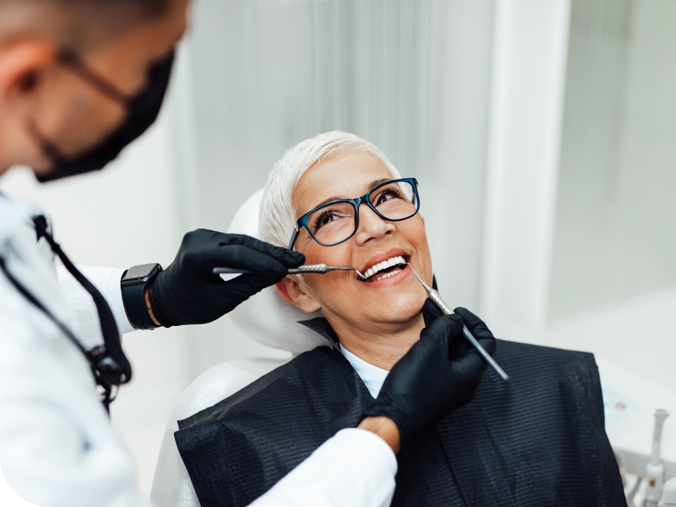 Dentist checking a patient's teeth