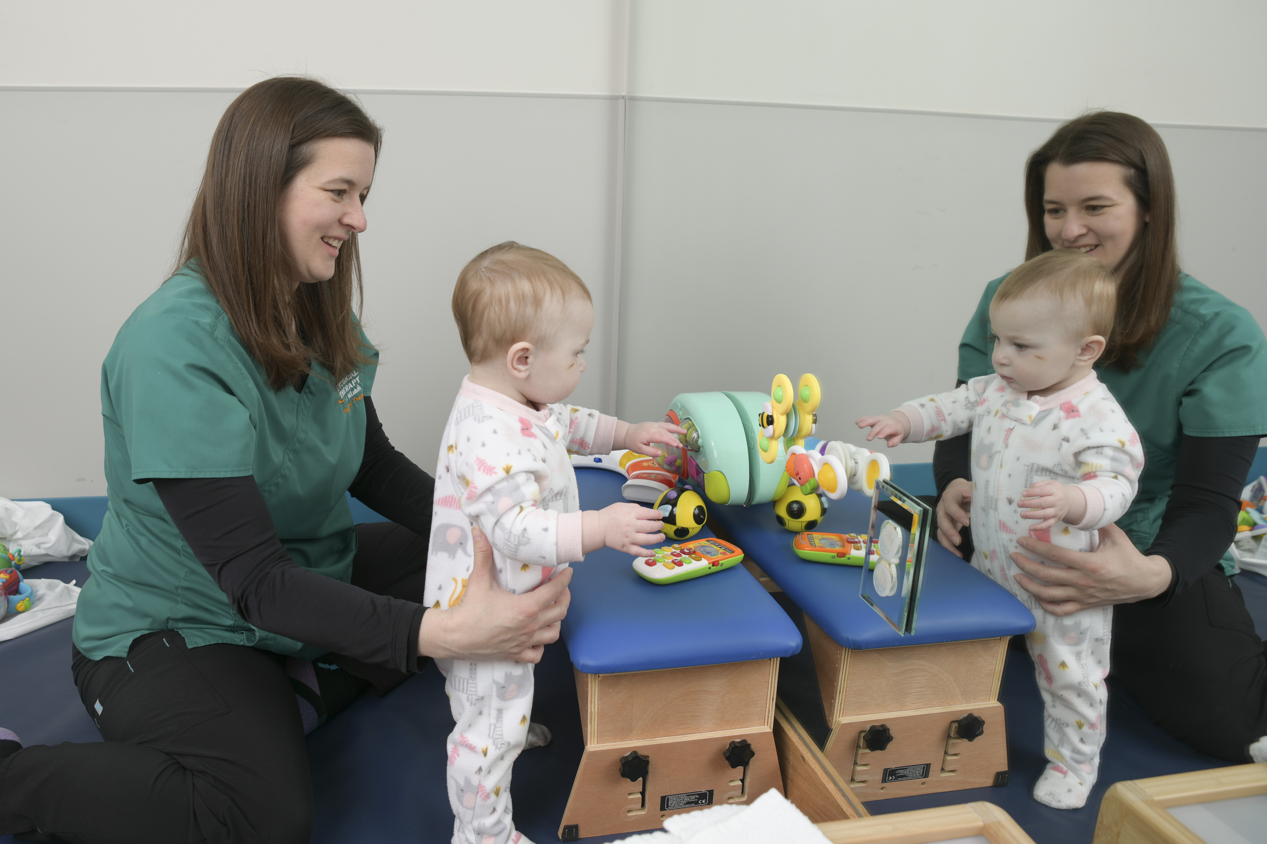 Physical Therapist working with a young child
