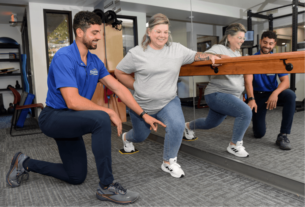 Physical Therapist working with a patient