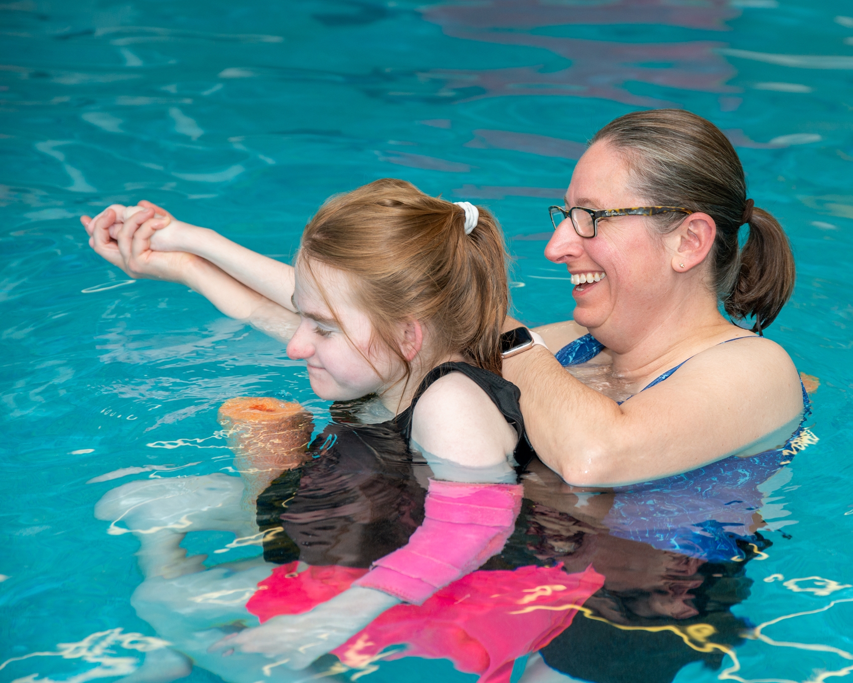 Physical Therapist playing with a young child