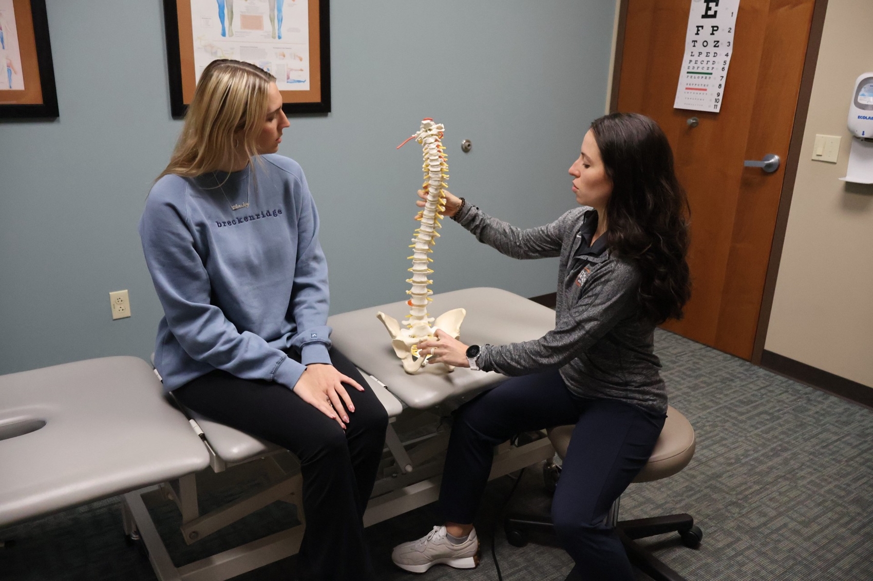 Two people in an exam room