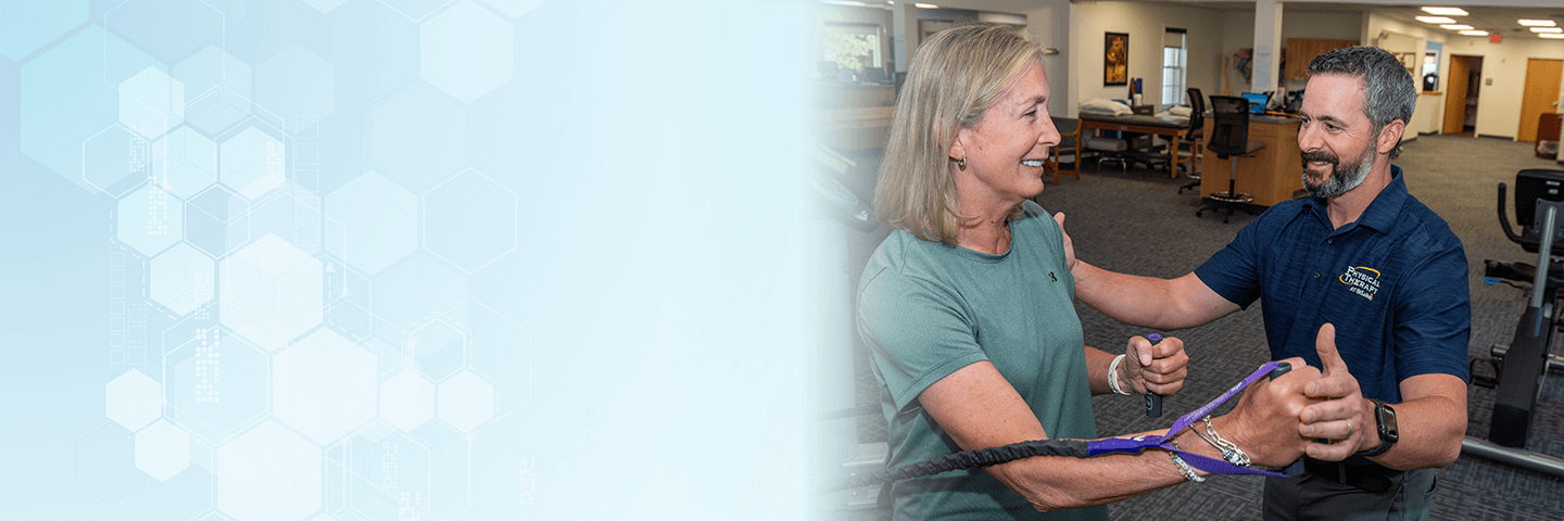 Physical therapist talking with patient