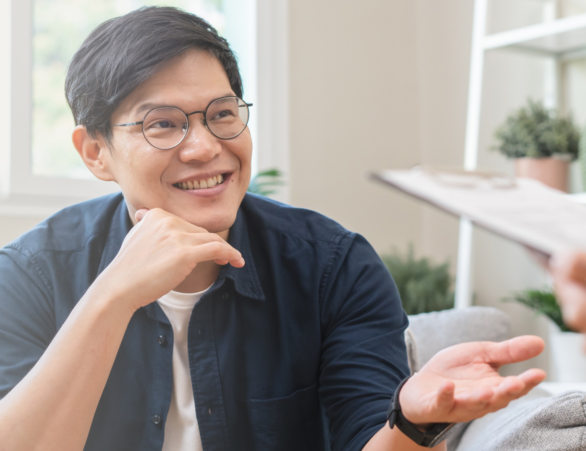 Young individual talking with a medical professional