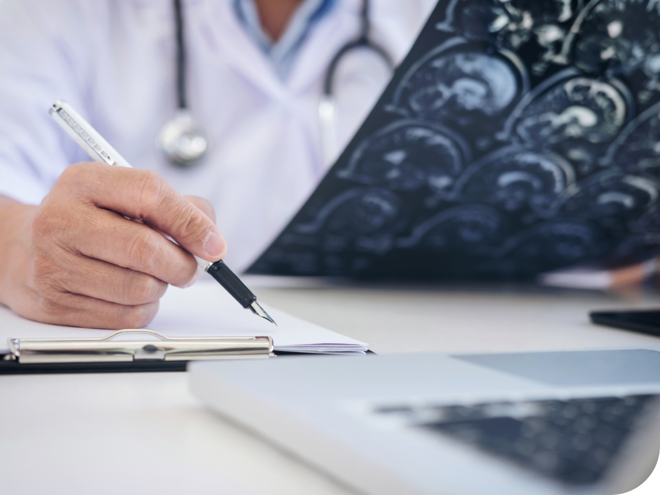 Medical professional looking at brain scan results