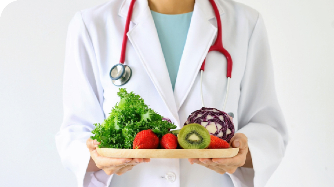 Medical professional holding a plate of salad