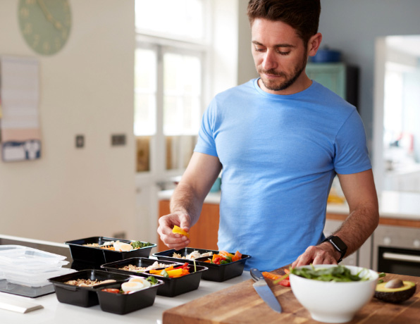 Individual prepping a big healthy meal