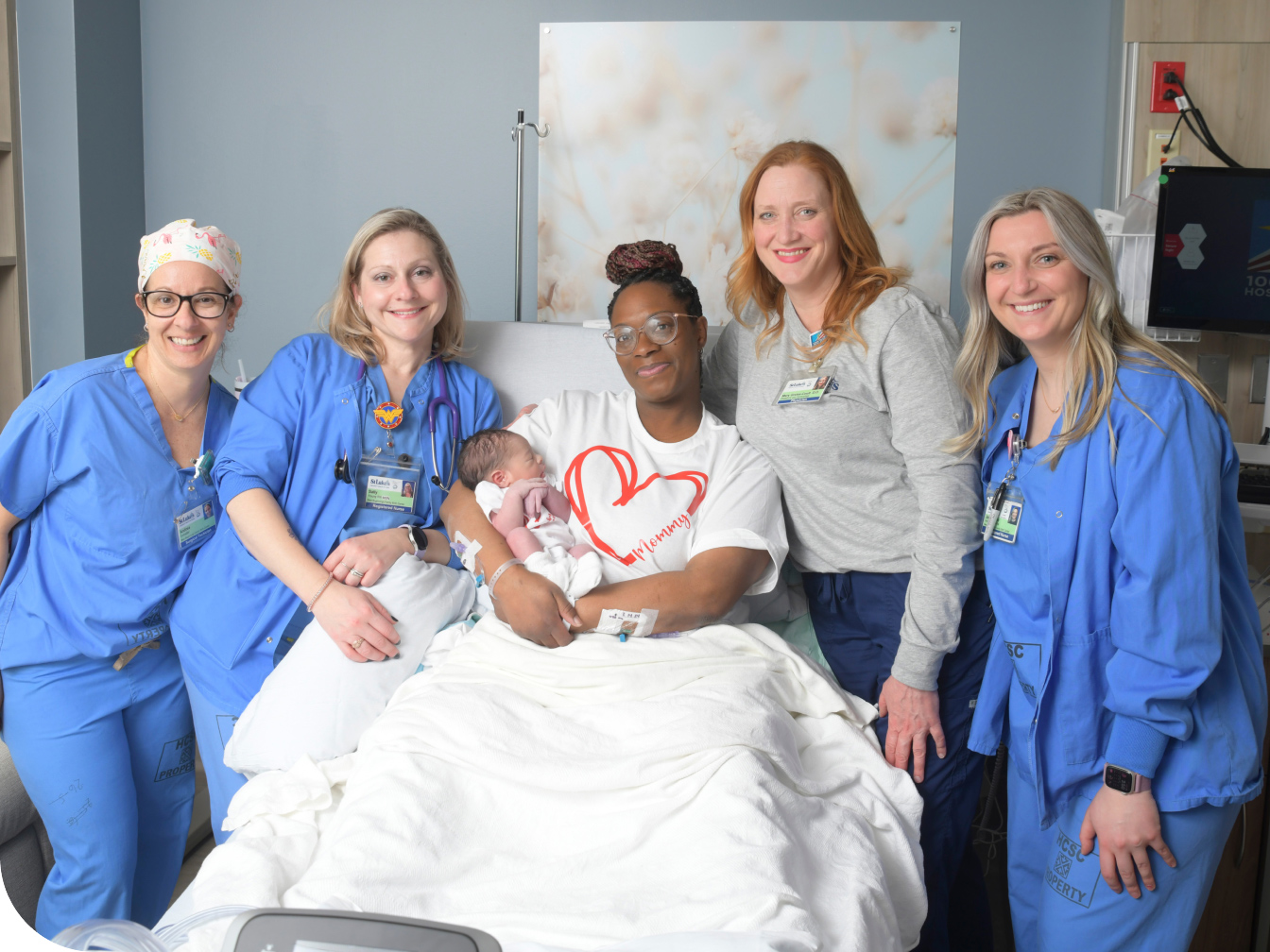 OBGYN Team around a new mom and baby
