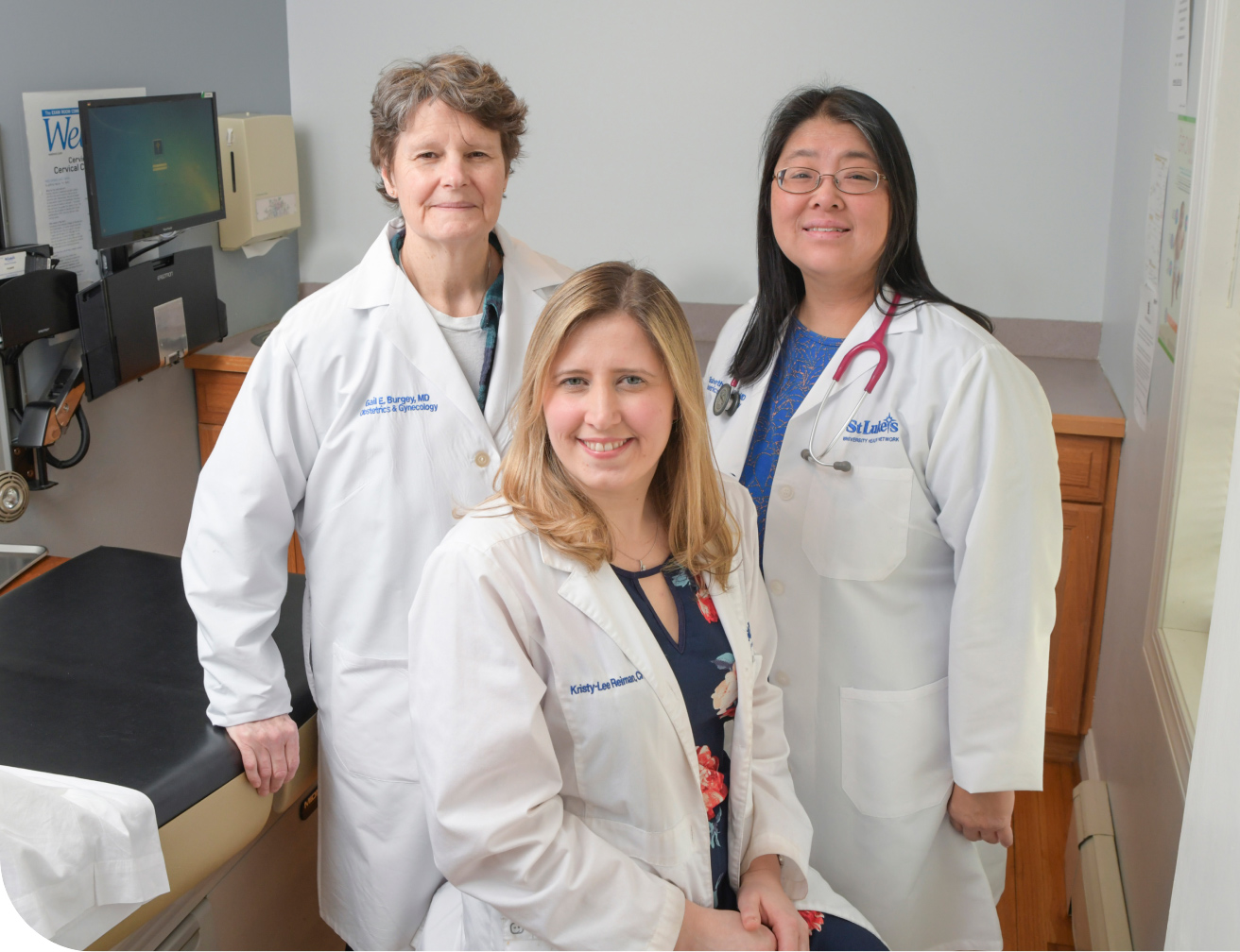 Three Medical Professionals in a nurse station
