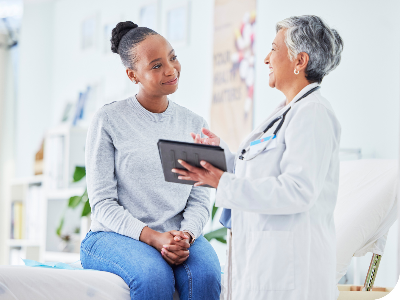 Medial professional talking with a patient