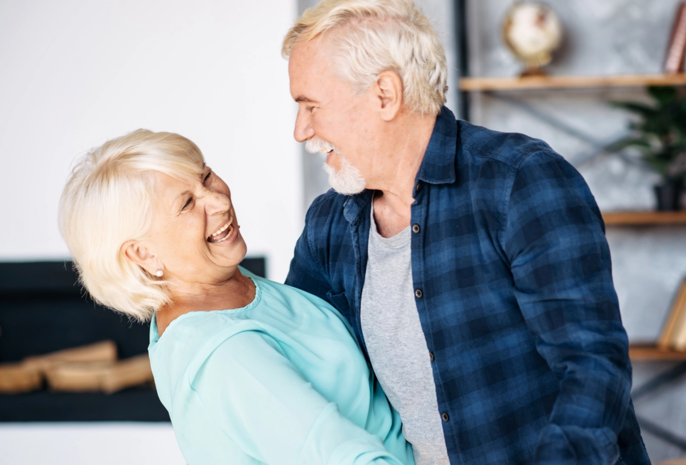 Elderly adult couple dancing together